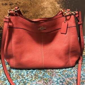 Coach salmon colored crossover or shoulder bag